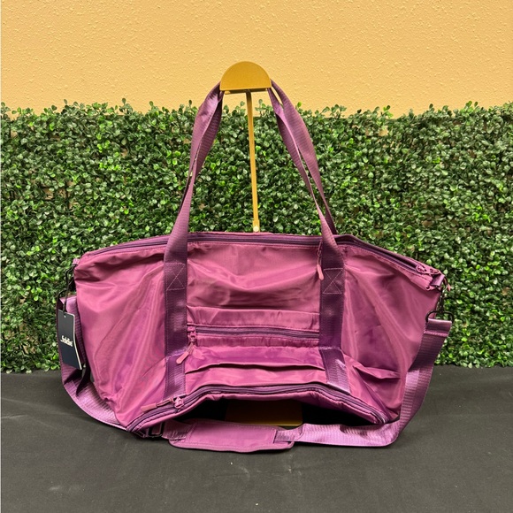 The Foldie Travel Bag In Fuchsia - Picture 2 of 13